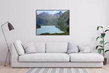 Load image into Gallery viewer, This Switzerland art contains beauty in this art landscape, with wellness, resilience, and joy through the Swiss art piece on a wall above a cozy sofa.