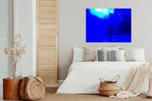 Load image into Gallery viewer, The blue abstract art inspires people to experience release for resilience into joy, depth, and expansion. The art is located in a bedroom above the bed.