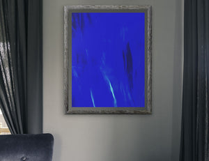 The blue abstract art piece is structured to transmit energy & harmony. This vibrant art is full of fascination to experience featured in a polished room.